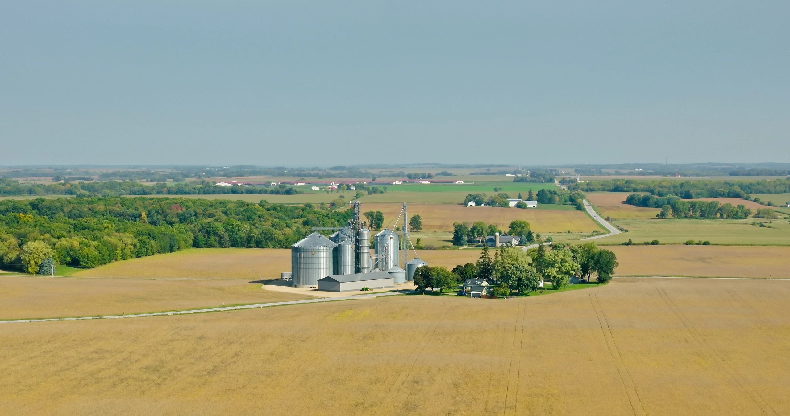 Aerial view of grain silos in farmland