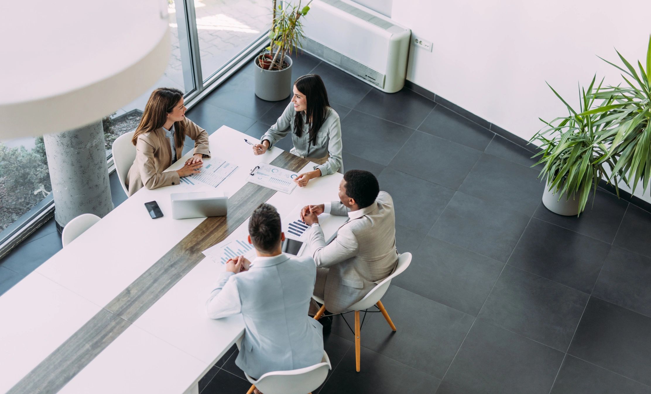 Business leaders reviewing risk strategy in a boardroom