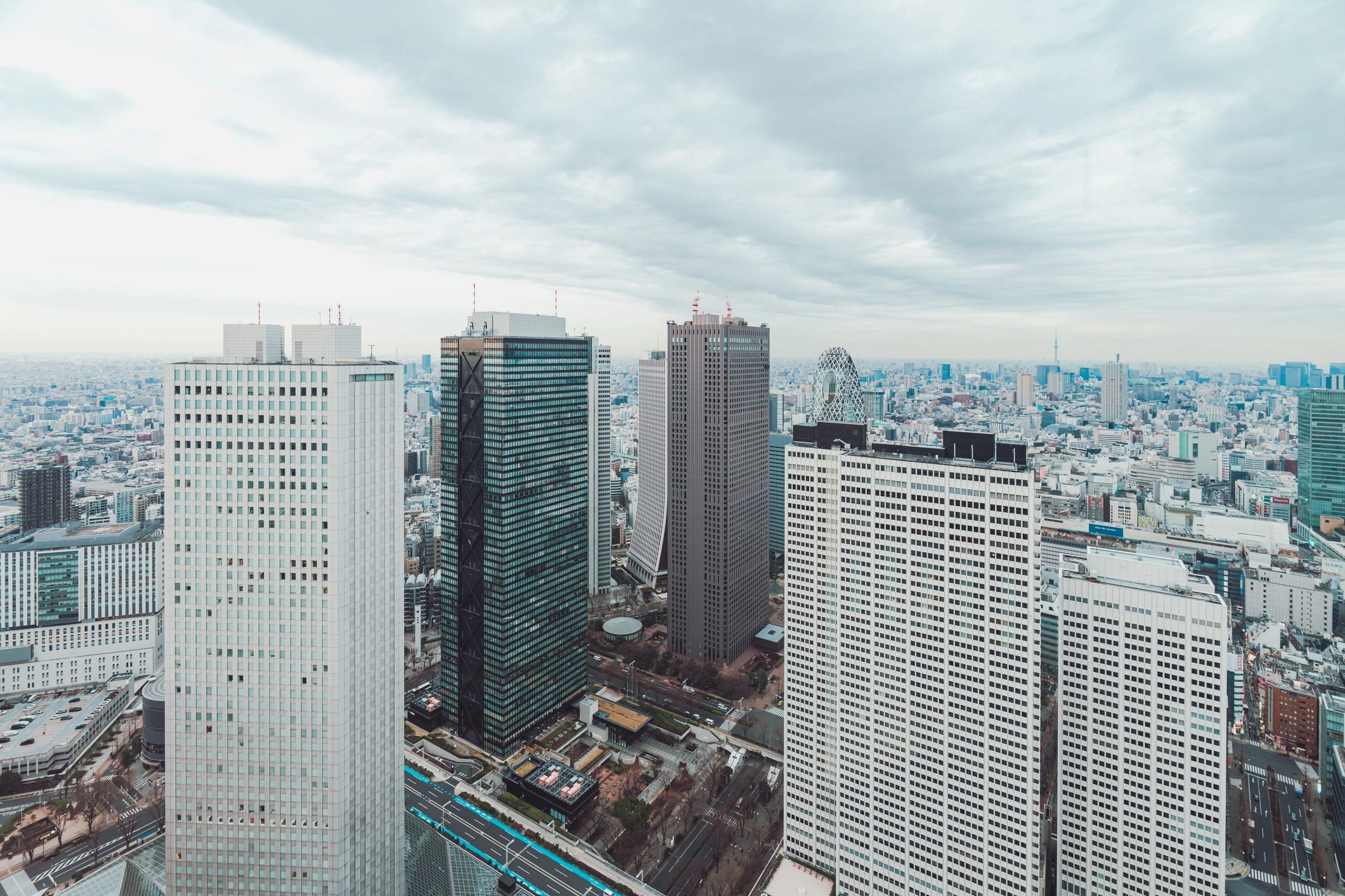 Modern city and commercial skyline representing insurance broking and market access